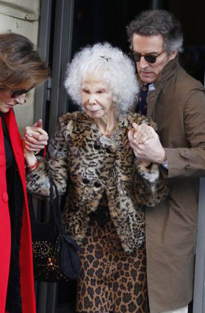 The Duchess of Alba leaves a Madrid restaurant with husband Alfonso Díez.