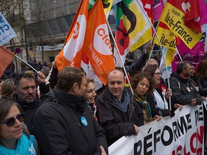The leader of the CFDT union, Laurent Berger, (c) at a demonstration in Paris on Tuesday.