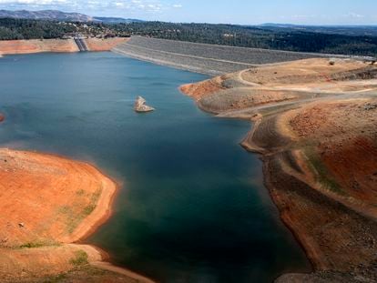 Dry hillsides surround Lake Oroville on May 22, 2021, in Oroville, Calif.
