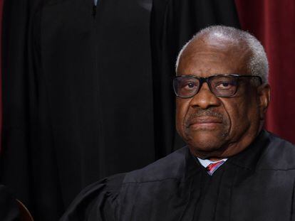 Justice Clarence Thomas poses for the official Supreme Court portrait in October in Washington.