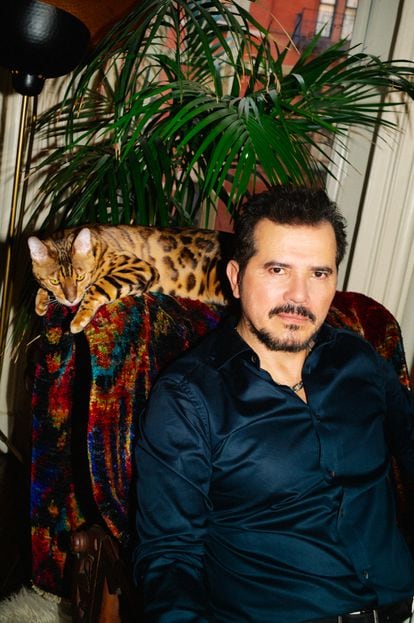John Leguizamo poses alongside Leo, his Bengal cat, at his home in New York.
