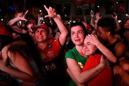 Lula's supporters celebrate his victory on Sunday in Rio de Janeiro.