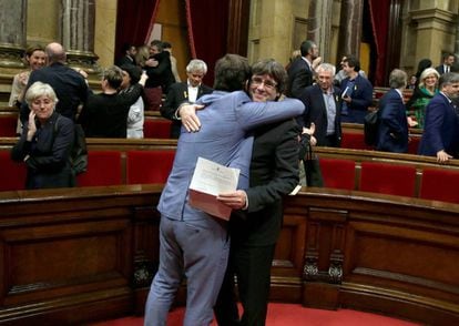 Catalan premier Carles Puigdemont and fellow separatists celebrating the vote.