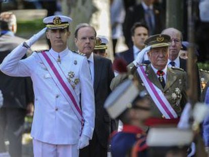 Prince Felipe (left) and King Juan Carlos during a military parade.