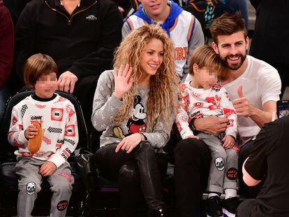 Shakira and Gerard Piqué with sons Milan and Sasha at Madison Square Garden, New York, in December 2017. 