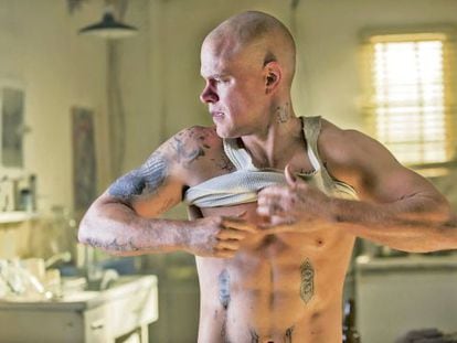 A shaven-headed Matt Damon stars in Elysium.