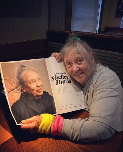 Shelley Duvall poses with the issue of 'The Hollywood Reporter' in which she broke her years-long silence and told her story, in an image the magazine shared on social media. 