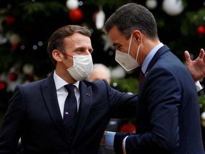 French President Emmanuel Macron welcomes Spanish Prime Minister Pedro Sanchez at the Elysee Palace as part of events marking the 60th anniversary of the signing of the OECD convention in Paris.