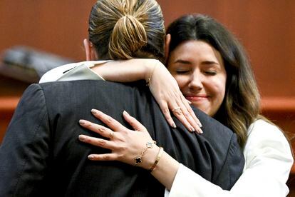 Johnny Depp hugs his lawyer Camille Vasquez after she cross-examined Amber Heard.