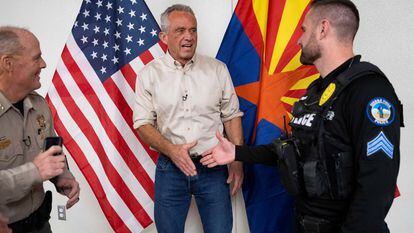 Independent presidential candidate Robert F. Kennedy Jr. shakes hands with a Sierra Vista Police officer, after a roundtable discussion on local impacts of the influx of migrants across the U.S.-Mexico border, with Cochise County law enforcement, elected officials and community members, at Cochise College in Sierra Vista, Arizona, U.S., February 6, 2024.