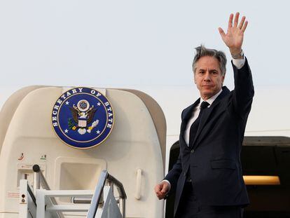 U.S. Secretary of State Antony Blinken waves as he boards an airplane to depart for the Philippines from Osan Air Base, in Pyeongtaek, South Korea, March 18, 2024.