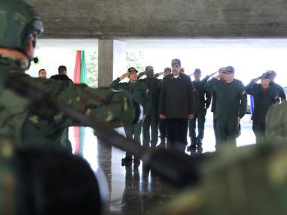 Nicolás Maduro meets with members of the military at the Ministry of Defense in Caracas, on December 28.