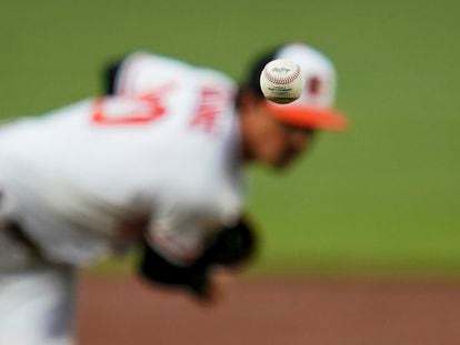 Baltimore Orioles starting pitcher Spenser Watkins throws a pitch to the Minnesota Twins during the second inning of a baseball game, May 5, 2022, in Baltimore.