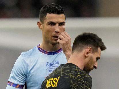 Cristiano Ronaldo gestures playing for a combined XI of Saudi Arabian teams Al Nassr and Al Hilal is flanked by PSG's Lionel Messi during a friendly soccer match, at the King Saud University Stadium, in Riyadh, Saudi Arabia, Thursday, Jan. 19, 2023.