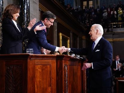 Joe Biden shakes hands with the Speaker of the House, Republican Mike Johnson.