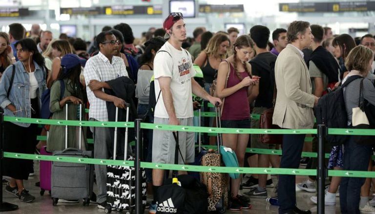 Snaking lines at security checkpoints in Barcelona's El Prat airport on Thursday.