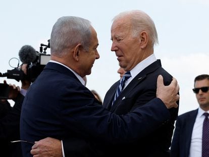 Israeli Prime Minister Benjamin Netanyahu receives U.S. President Joe Biden in Tel Aviv on October 18.