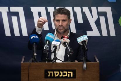 Israeli Minister of finance and leader of National Zionism, Bezalel Smotrich, speaks to the press during a party meeting on February 5, 2024, in Jerusalem.
