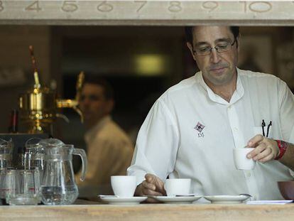 A waiter in Seville.