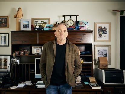 Writer Dennis Lehane poses at his house in Los Angeles.