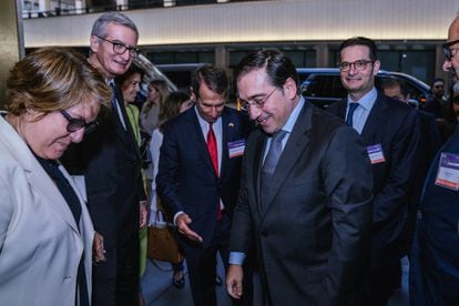 Spain’s Foreign Minister José Manuel Albares and Joseph Oughourlian and Alan D. Solomont – the respective presidents of Prisa and the Spain-U.S. Chamber of Commerce – arrive at the international forum ‘Latin America, the United States and Spain in the global economy’ in New York City