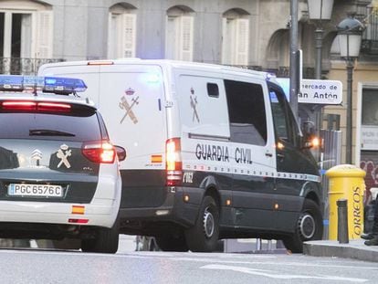 Police vehicles arrive at the Supreme Court in Madrid.