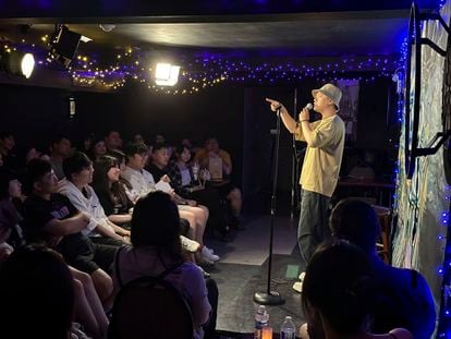 In this photo provided by comedian Lin Dongxiao, who uses the stage name Guazi, Lin performs standup in Toronto, Saturday, June 10, 2023.