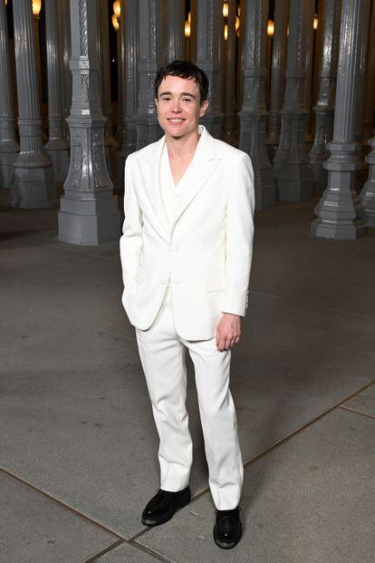 Elliot Page, ambassador for Gucci fragrances, in a white tuxedo.