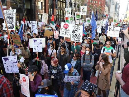 Protestors march toward Moscone Center where the APEC is being held, in San Francisco, California, 12 November 2023.