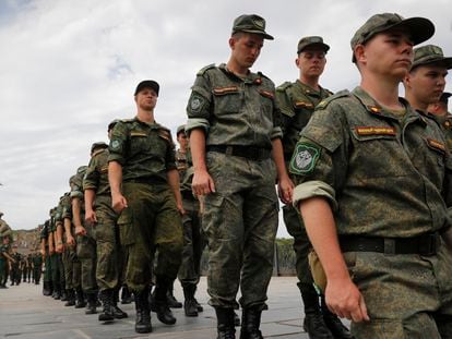 A group of Russian soldiers, in an act to support the invasion of Ukraine, in July.