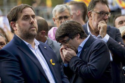 Catalan premier Carles Puigdemont (R) with his deputy Oriol Junqueras.