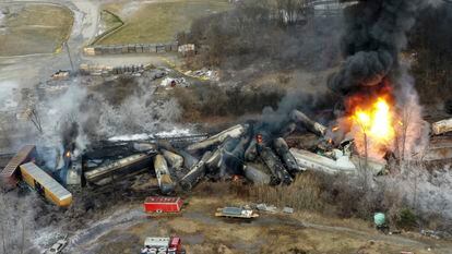 Portions of a Norfolk and Southern freight train that derailed the night before in East Palestine, Ohio