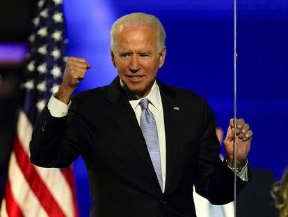 Then-President-elect Joe Biden gestures to supporters Nov. 7, 2020, in Wilmington, Del.