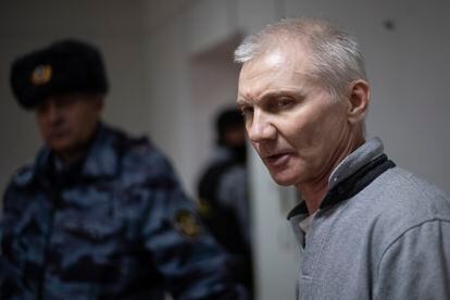 Alexei Moskalyov, right, is escorted from a courtroom in Yefremov, Tula region, south of Moscow, Russia, on March 27, 2023.