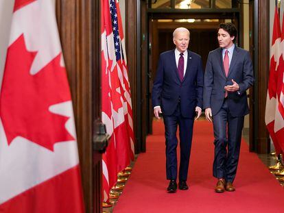 U.S. President Joe Biden walks with Canadian Prime Minister Justin Trudeau in Ottawa, Ontario, Canada, on March 24, 2023.