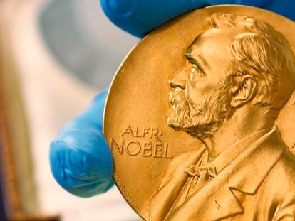 A April 17, 2015 file photo shows a gold Nobel Prize medal.