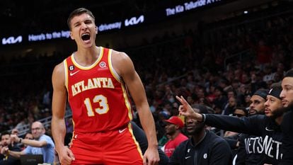 In this file photo taken on February 26, 2023 Bogdan Bogdanovic of the Atlanta Hawks reacts after a basket against the Brooklyn Nets during the fourth quarter at State Farm Arena in Atlanta, Georgia.