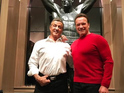 Sylvester Stallone and Arnold Schwarzenegger, in front of a statue of Rocky Balboa, in an image from the former's Instagram.