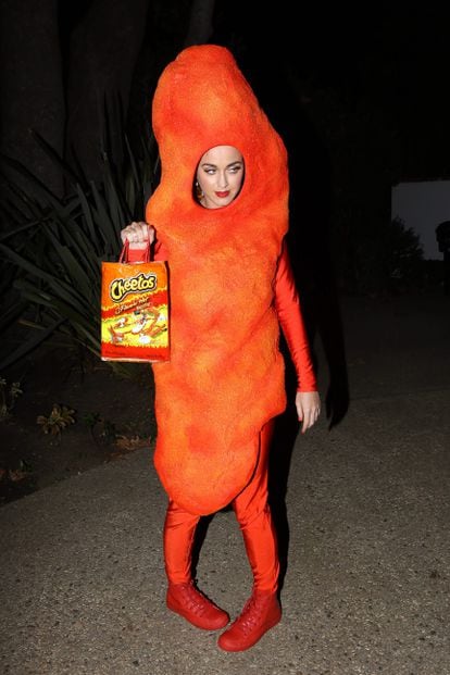 Katy Perry dressed up as a Flamin' Hot Cheeto at Kate Hudson's Annual Halloween Party. The look was to become one of the singer's most famous Halloween costumes.


