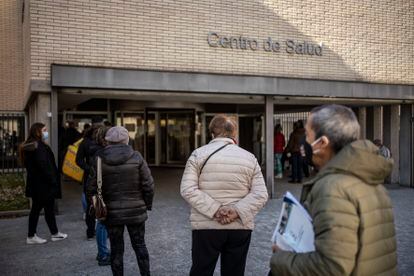 Patients wait outside Los Yébenes medical center in Madrid.