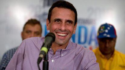 Opposition leader Henrique Capriles appears before the press after Sunday’s vote.