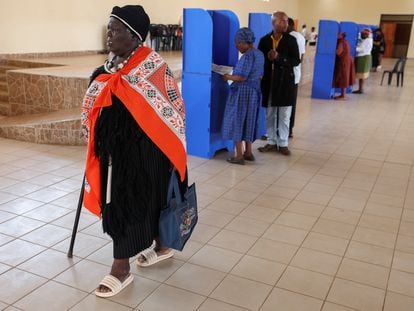 A voter leaves the polling station after casting her ballot during Eswatini's parliamentary elections in Mbabane, Eswatini, September 29, 2023.