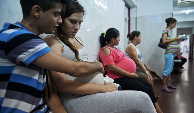 A young mother at a medical clinic in Buenos Aires.