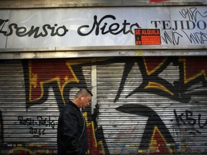 A shuttered shop in downton Madrid, circa 2010.