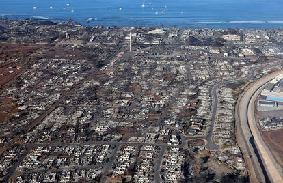 In an aerial view, homes and businesses are seen that were destroyed by a wildfire on August 11, 2023 in Lahaina, Hawaii. Dozens of people were killed and thousands were displaced after a wind-driven wildfire devastated the town of Lahaina on Tuesday.