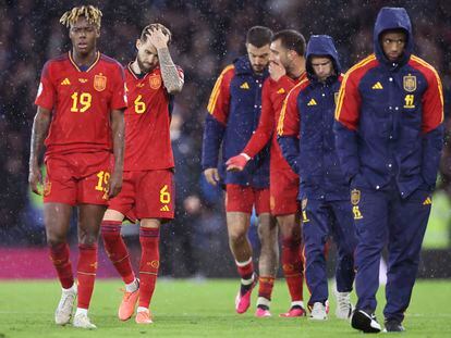 Spain players walk off dejected following a Euro 2024 group A qualifying soccer match between Scotland and Spain at the Hampden Park stadium in Glasgow, Scotland, Tuesday, March 28, 2023.