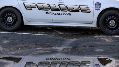 A Goodhue police car is parked outside City Hall on Monday, Aug. 14, 2023, in Goodhue, Minn. The small  town will soon be without a police department, an exodus spurred by low pay for the chief and his officers
