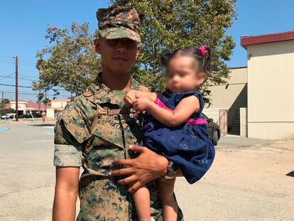 U.S. Marine Roberto Salazar with his daughter.