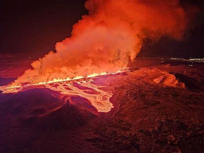 A volcano spews lava and smoke as it erupts, near Grindavik, on Reykjanes Peninsula, Iceland, February 8, 2024.