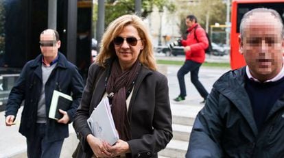 Princess Cristina arrives at her place of work in Barcelona on Friday morning. 